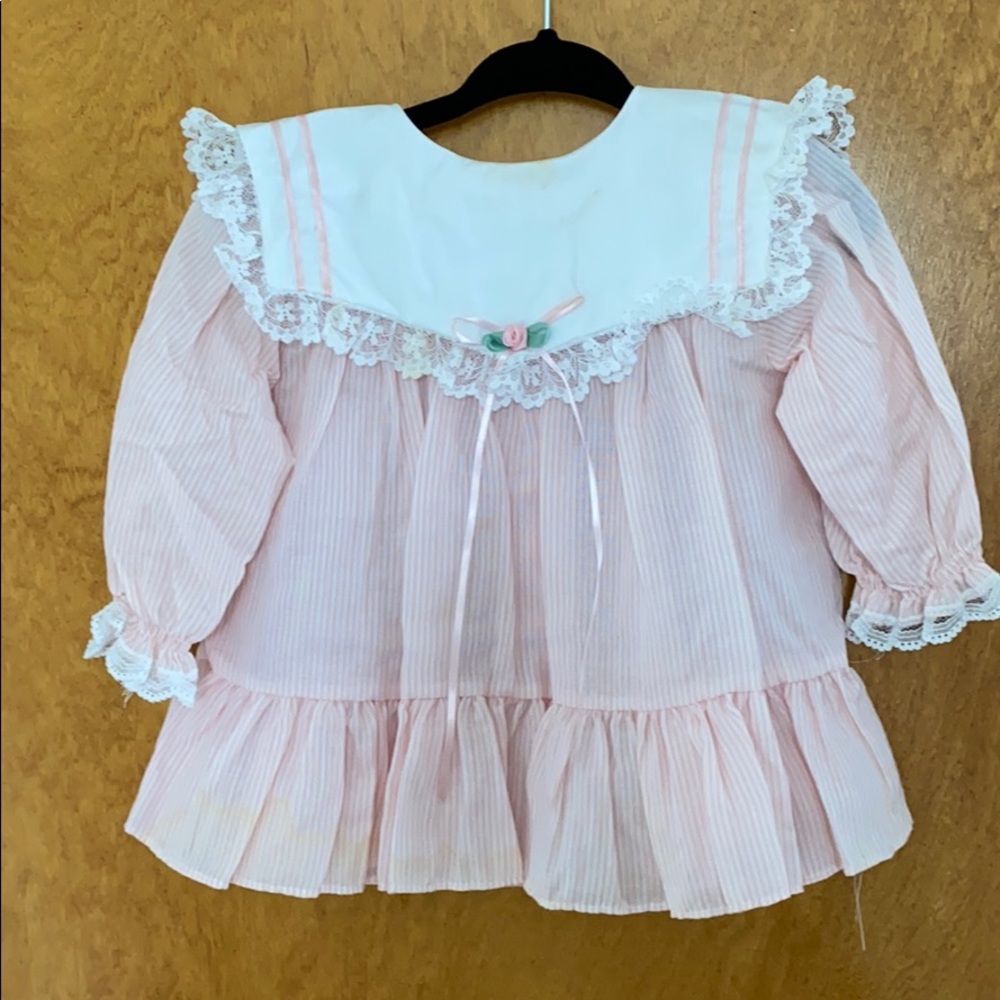 Vintage children’s pink strip dress